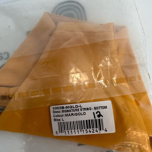 NWT Free People Toast Swim Signature String Bikini Bottom, Marigold, size Large - Picture 15 of 15